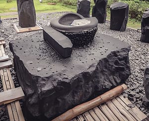 An illustration showcasing the evolution of stone technology, from primitive stone tools to advanced Blackstone innovations.